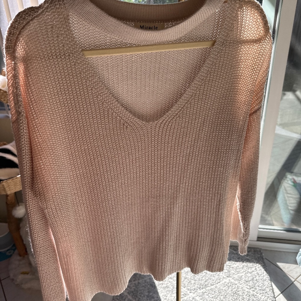 Cream/tan sweater with front cutout